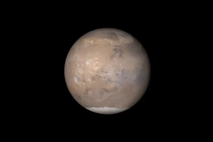 The view of Mars shown here was assembled from the Mars Global Surveyor's Mars Orbiter Camera on May 12, 2003. The Red Planet will be in opposition just after midnight Wednesday morning.